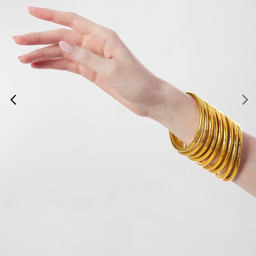 BuDhaGirl all weather gold bangles in new condition.  Full set of 9. Size M